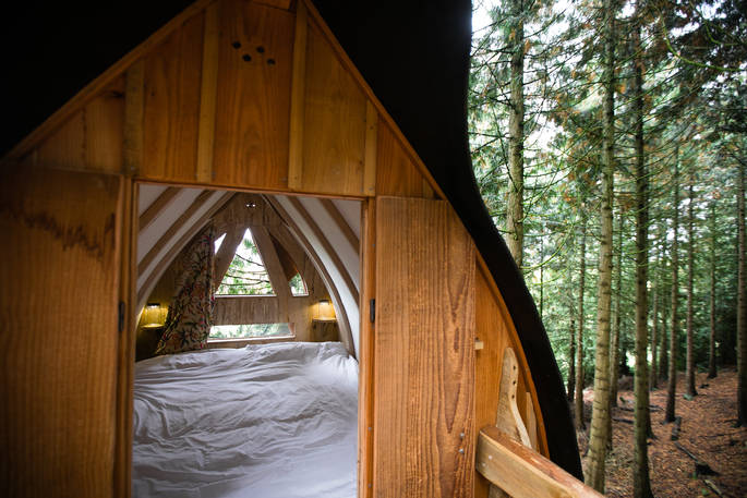 Cosy up in the sleeping pod at Puckshipton tree house and enjoy the views across the Pewsey Vale in Wiltshire 