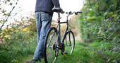 Cycle towards Puckshipton tree house in Wiltshire with beautiful views